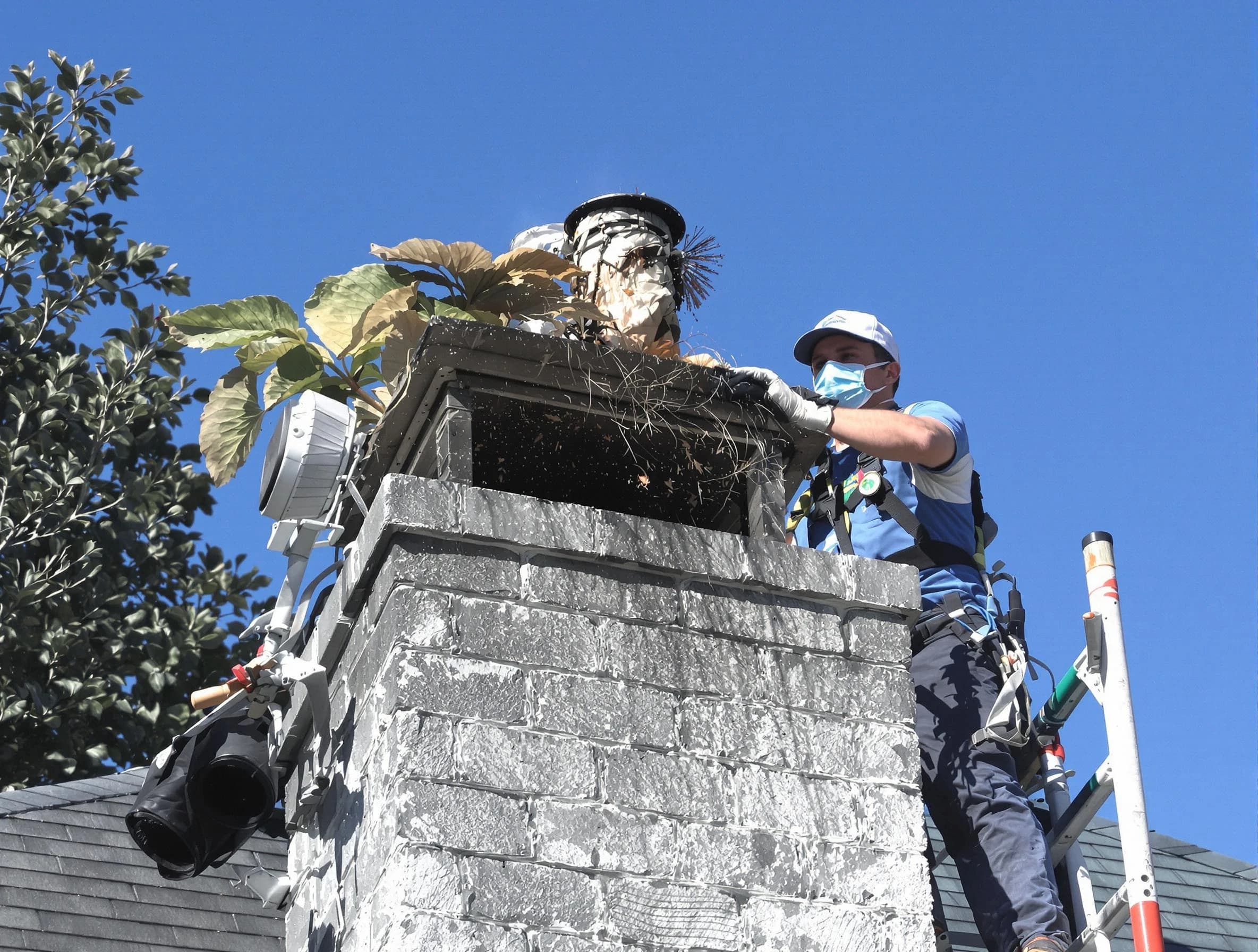 Marlboro Chimney Sweep specialist performing chimney cleaning in Marlboro, NJ