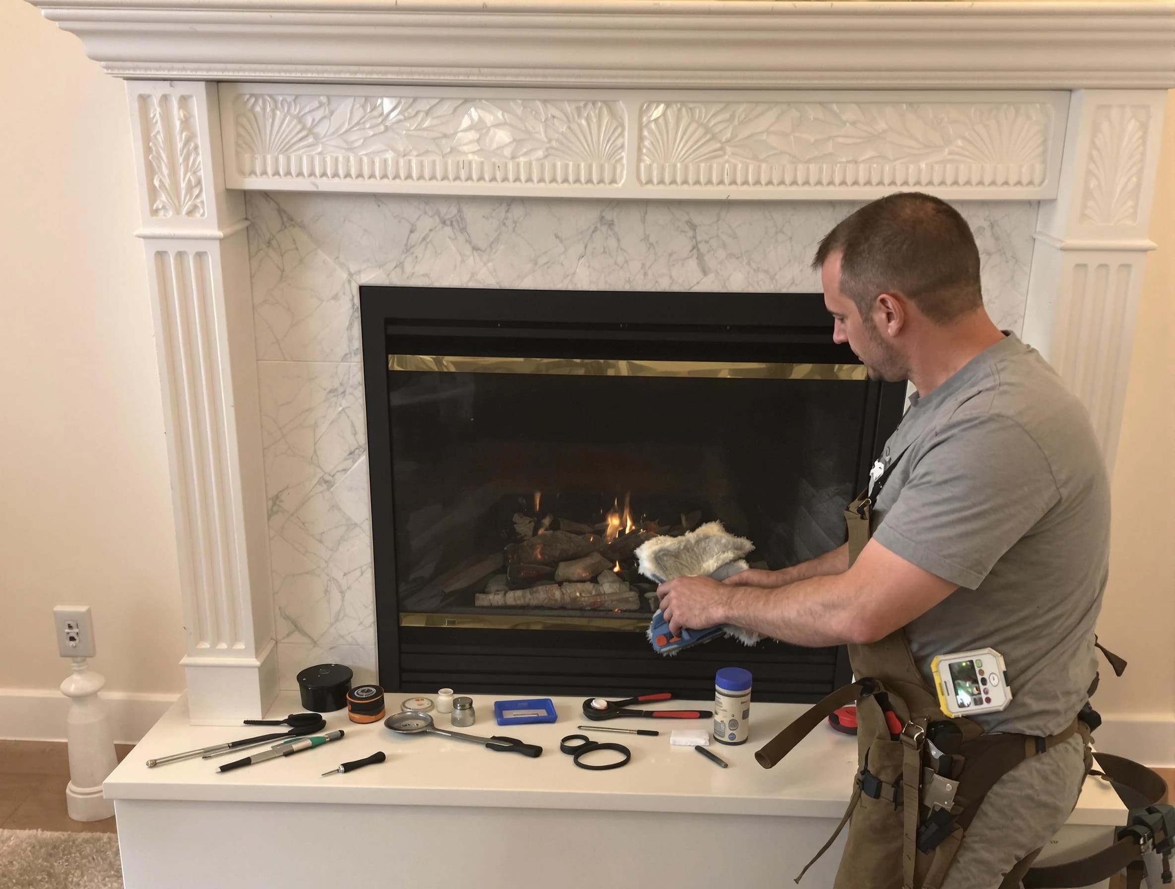 Marlboro Chimney Sweep performing fireplace maintenance in Marlboro, NJ